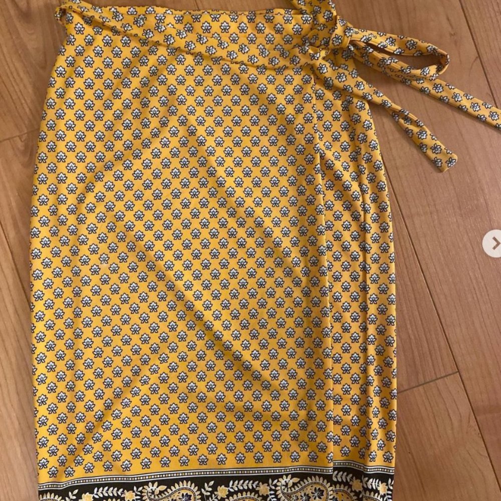 Michael Kors wrap around yellow skirt. Late 90’s and early 2000’s vibe.
